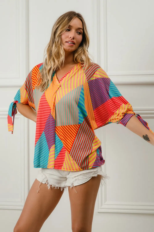 Geometric Print Jersey Blouse with Tie-Detail Sleeves