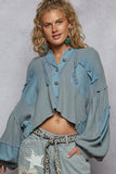 Distressed Denim Jacket with Cropped Raw Edge Detailing