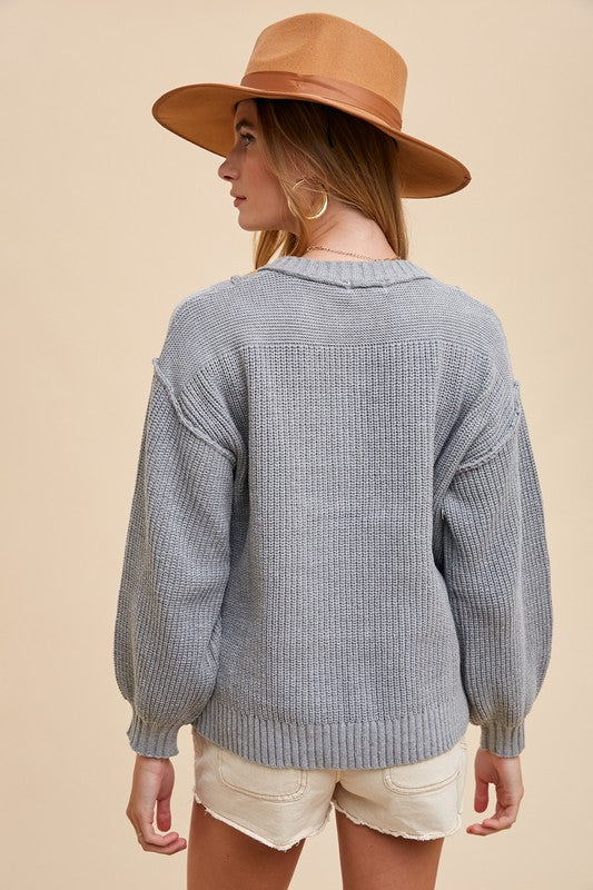 Half Button Ribbed Hem Sweater