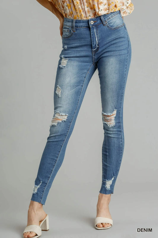 Edgy Distressed Denim Skinny Jeans with Raw Hem