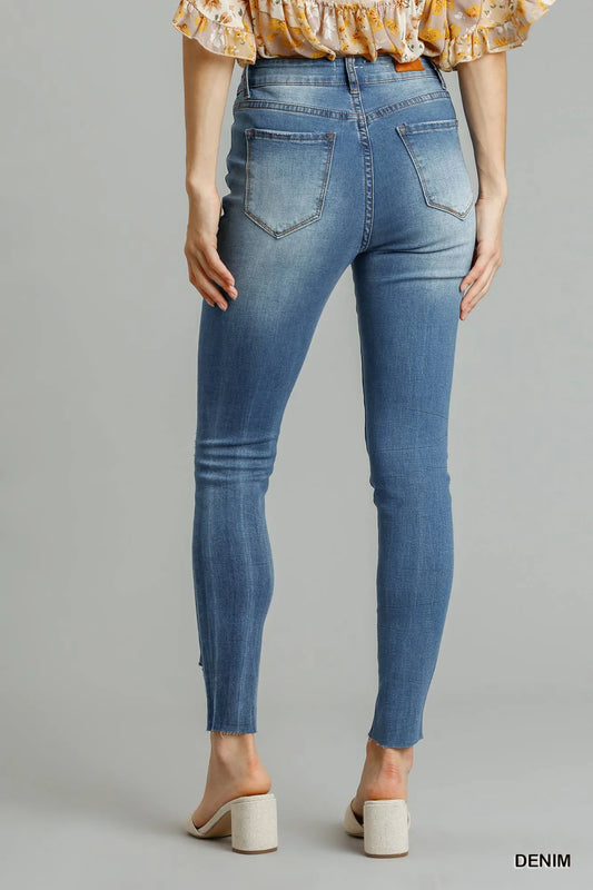 Edgy Distressed Denim Skinny Jeans with Raw Hem