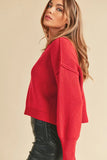 Ribbed Hem Exposed Seam Round Neck Sweater