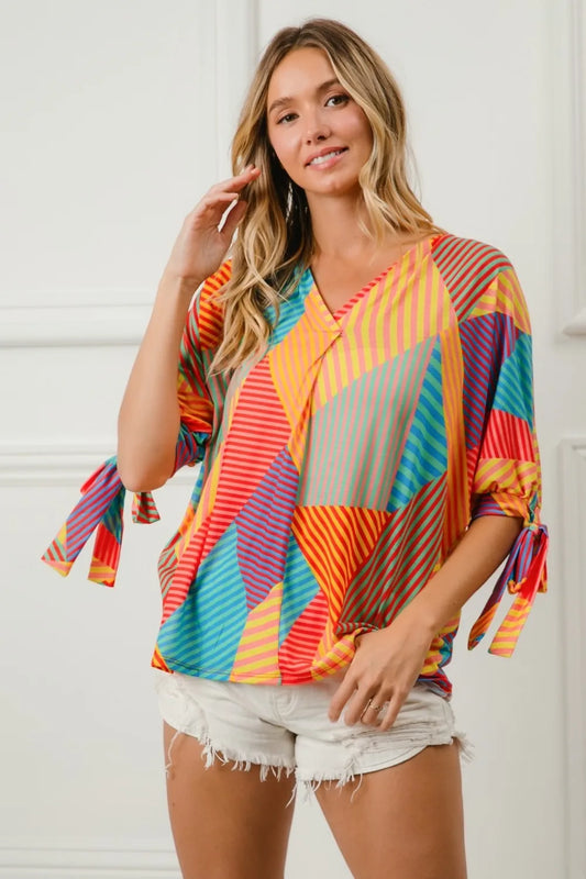 Geometric Print Jersey Blouse with Tie-Detail Sleeves