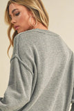 Ribbed Hem Exposed Seam Round Neck Sweater