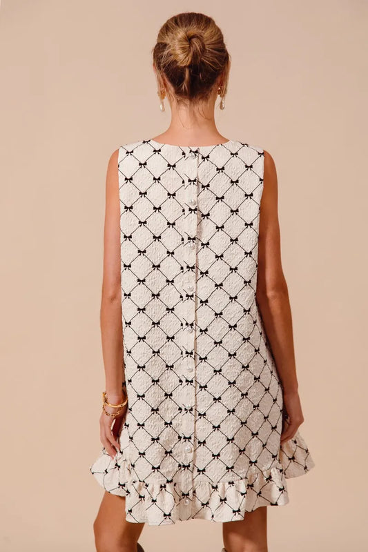Bow Patterned Sleeveless Ruffle Hem Dress
