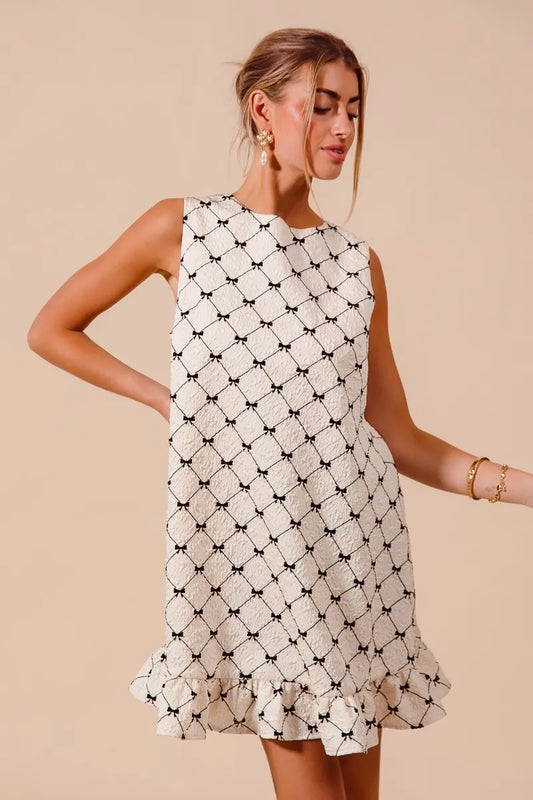 Bow Patterned Sleeveless Ruffle Hem Dress