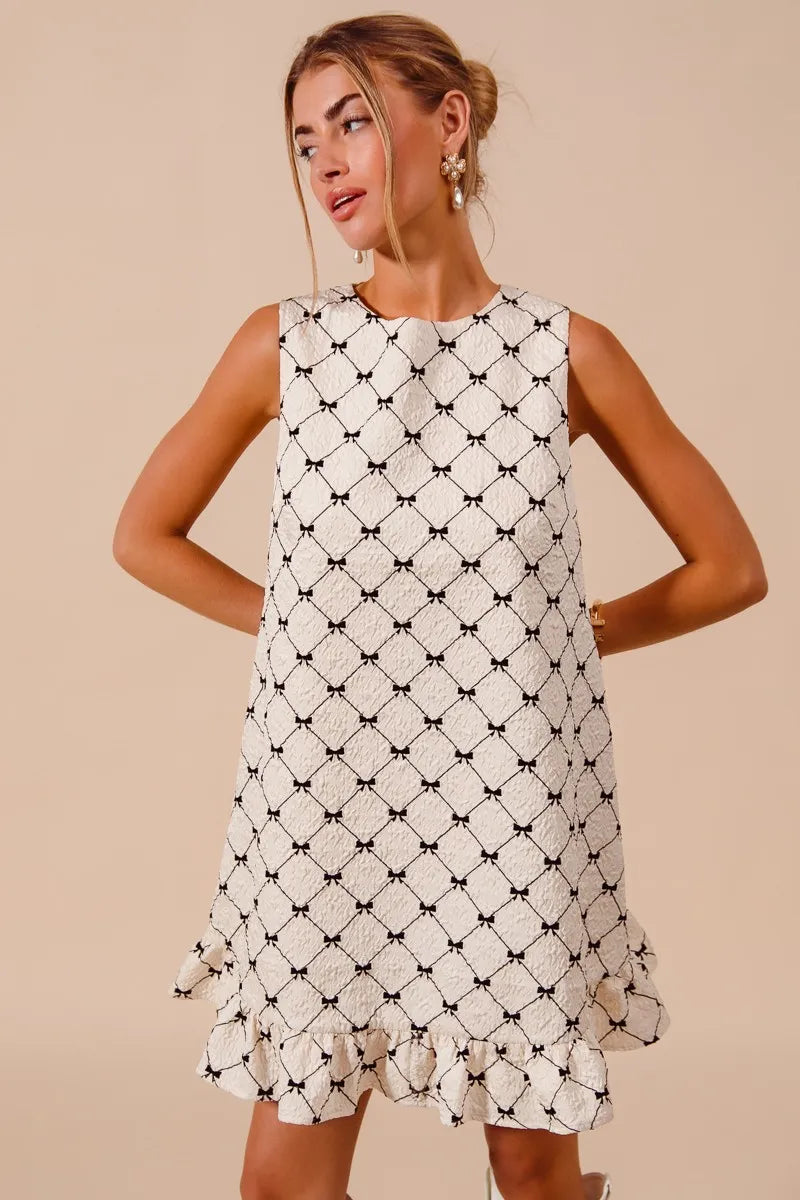 Bow Patterned Sleeveless Ruffle Hem Dress