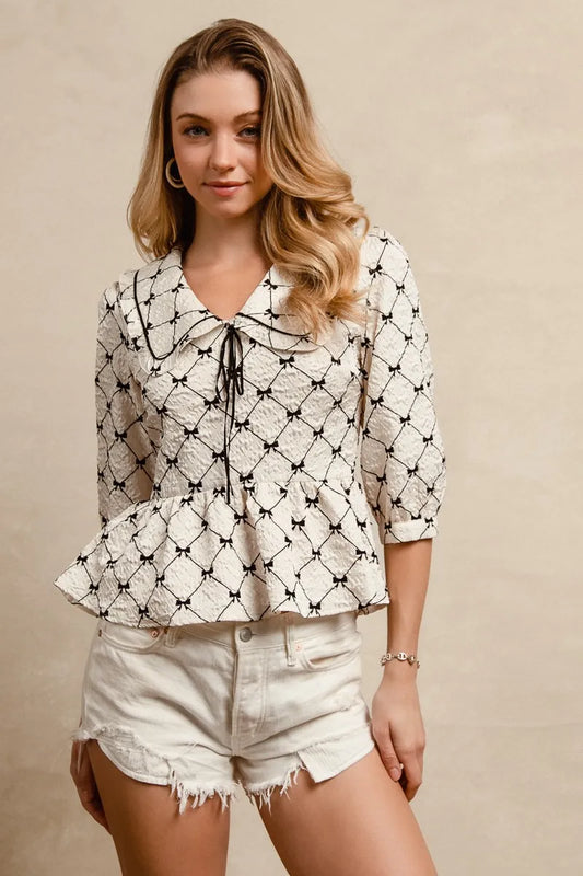 Geometric Print Peplum Blouse with Tie-Front V-Neck Collar