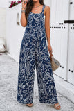 Geo Patterned Sleeveless Smocked Jumpsuit with Pockets