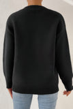 Star Pattern V-Neck Relaxed Knit Sweater