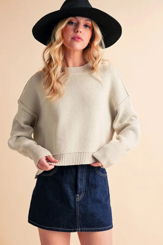 Ribbed Hem Exposed Seam Round Neck Sweater