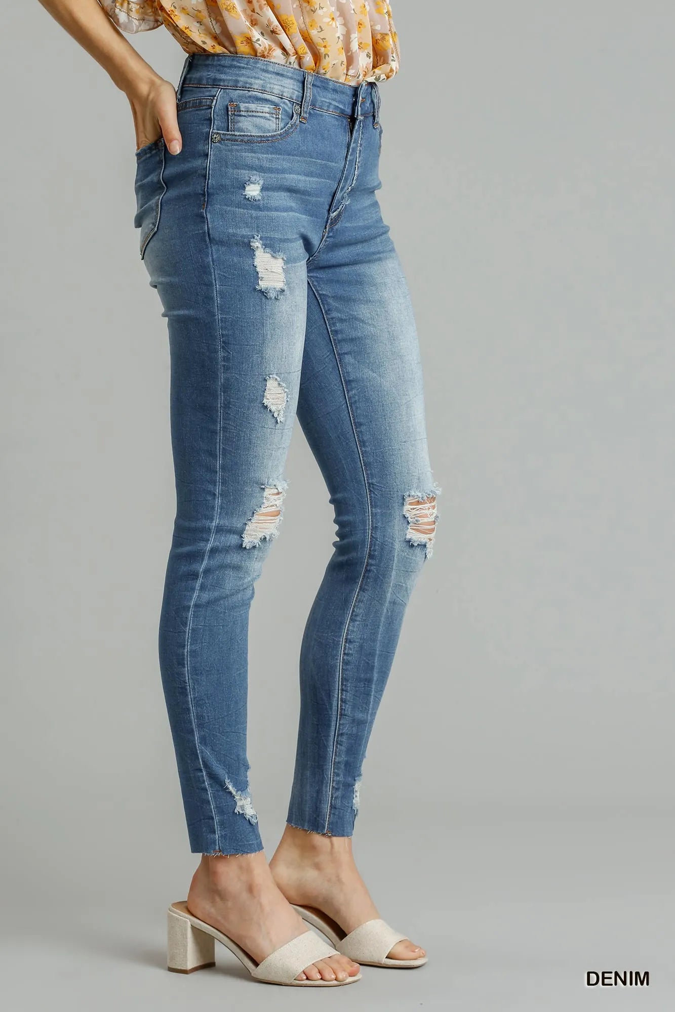 Edgy Distressed Denim Skinny Jeans with Raw Hem