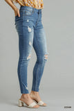 Edgy Distressed Denim Skinny Jeans with Raw Hem
