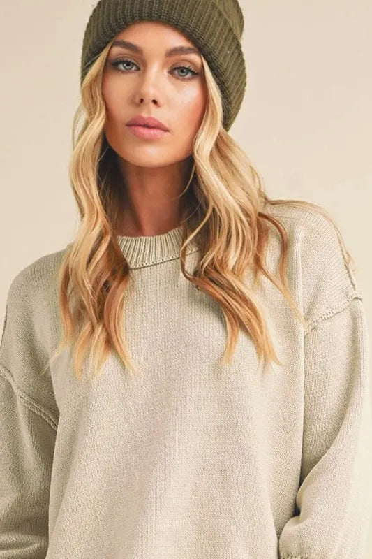 Ribbed Hem Exposed Seam Round Neck Sweater