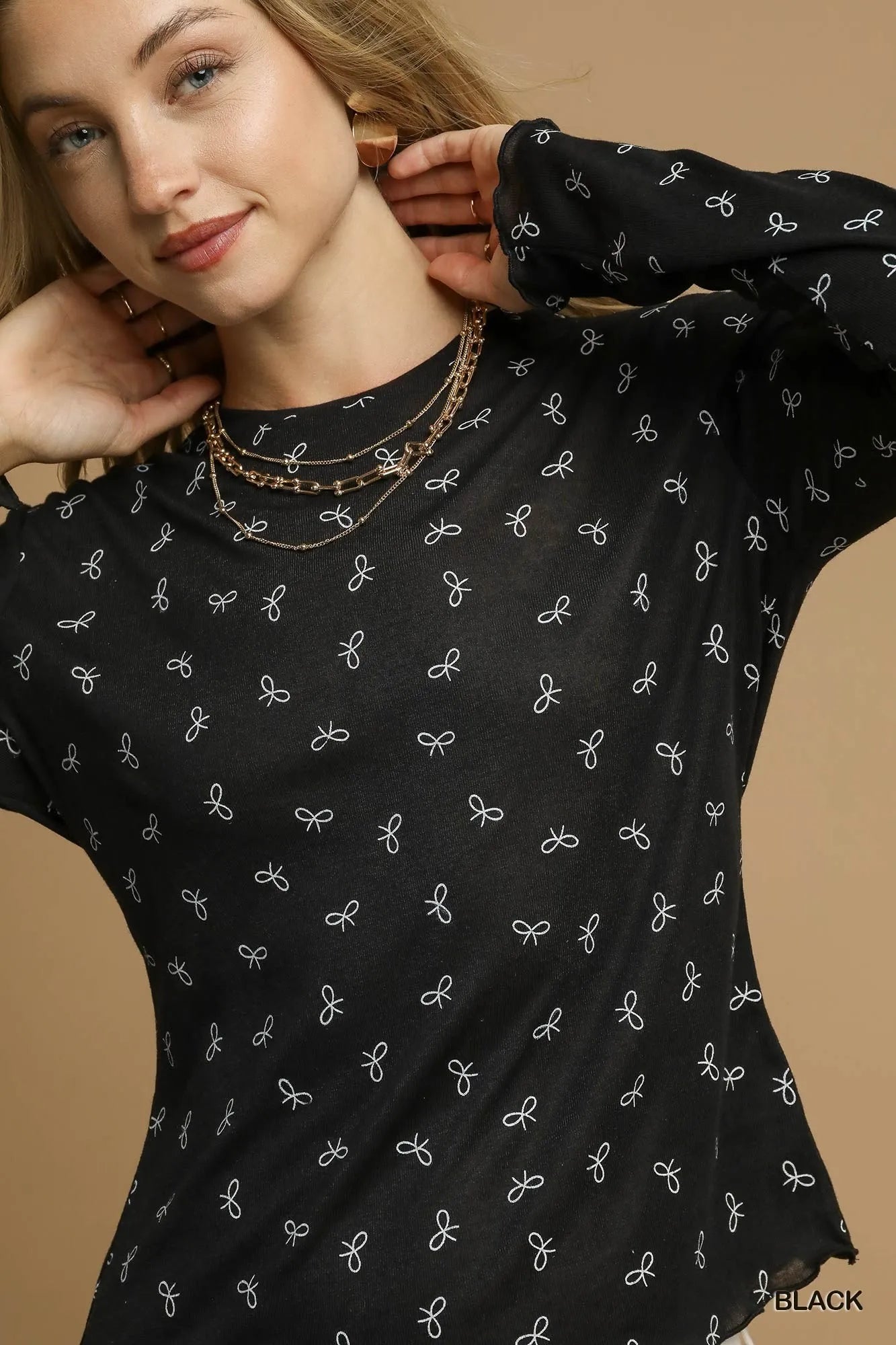 Bow Pattern Soft Knit Top